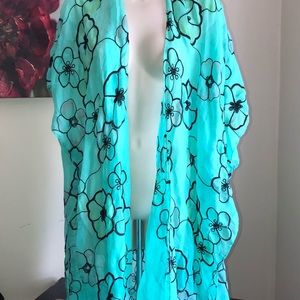 Mint green and black floral print kimono with yellow accents.